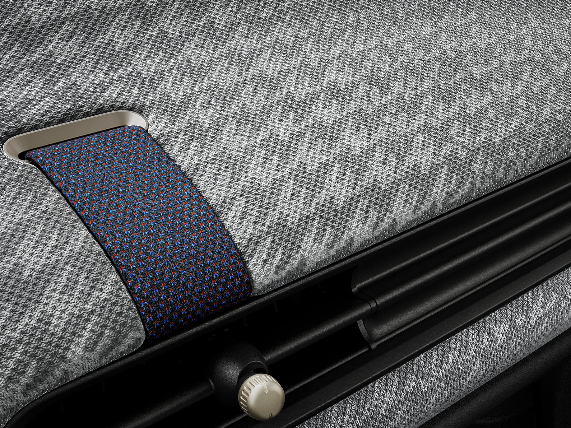 Вид зблизька на 2D-в'язану приладову панель всередині MINI Cooper.