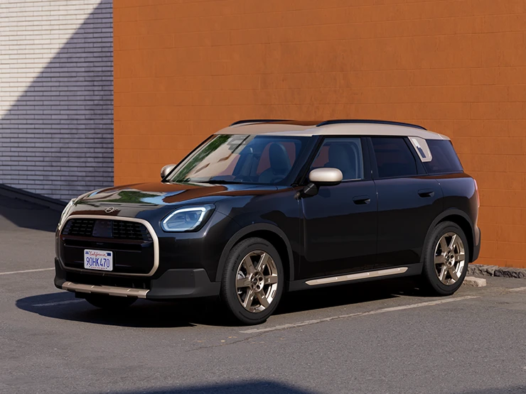 Вид спереду на MINI Countryman у кольорі Midnight Black з яскравим сріблястим дахом.